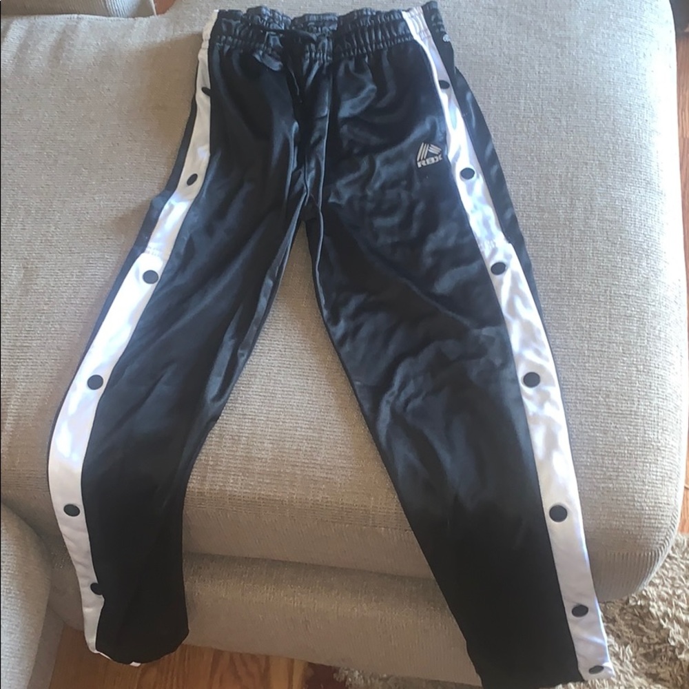 Reebok pants button all the way up the sides